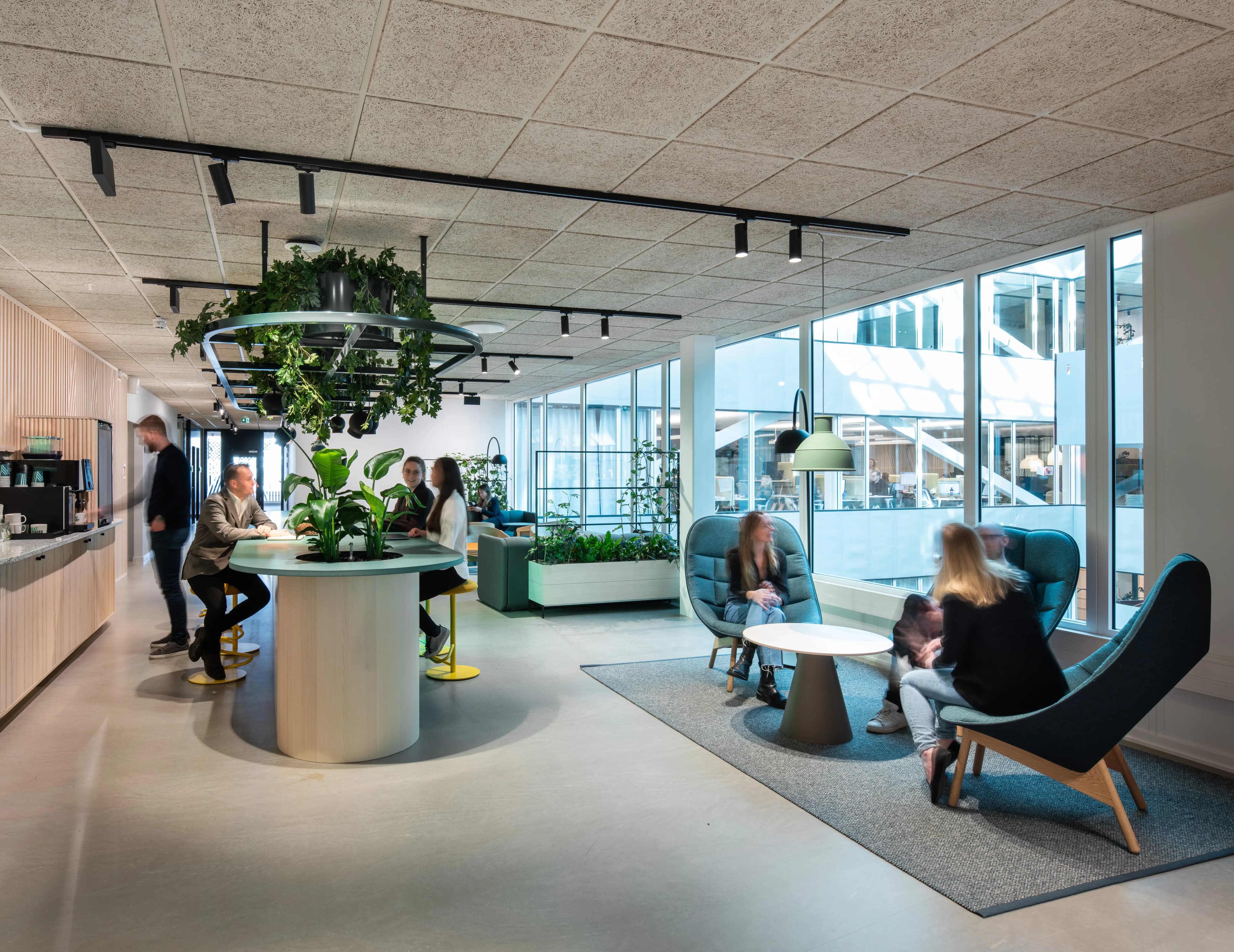 People lounging in Academic Work office